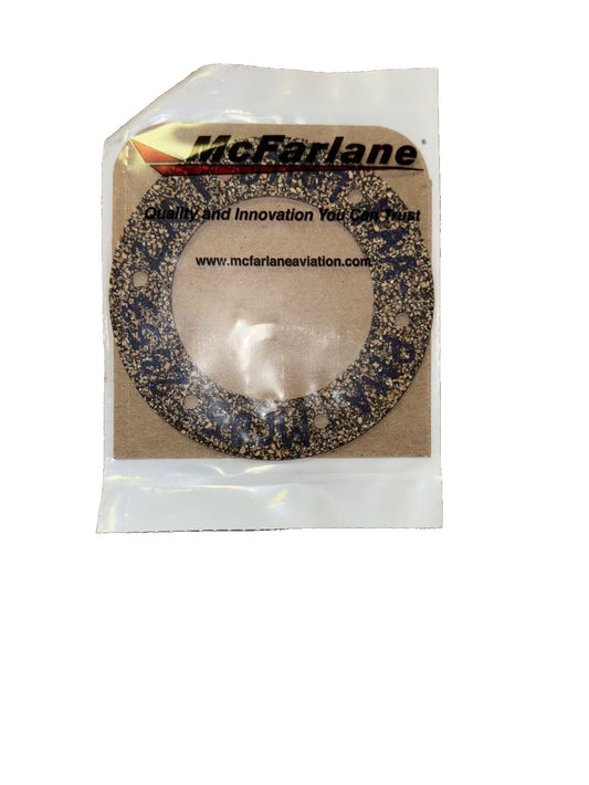 MC0523532 - GASKET, Fuel Tank Adapter, Mcfarlane – a small blue and white bracelet with a small white bea