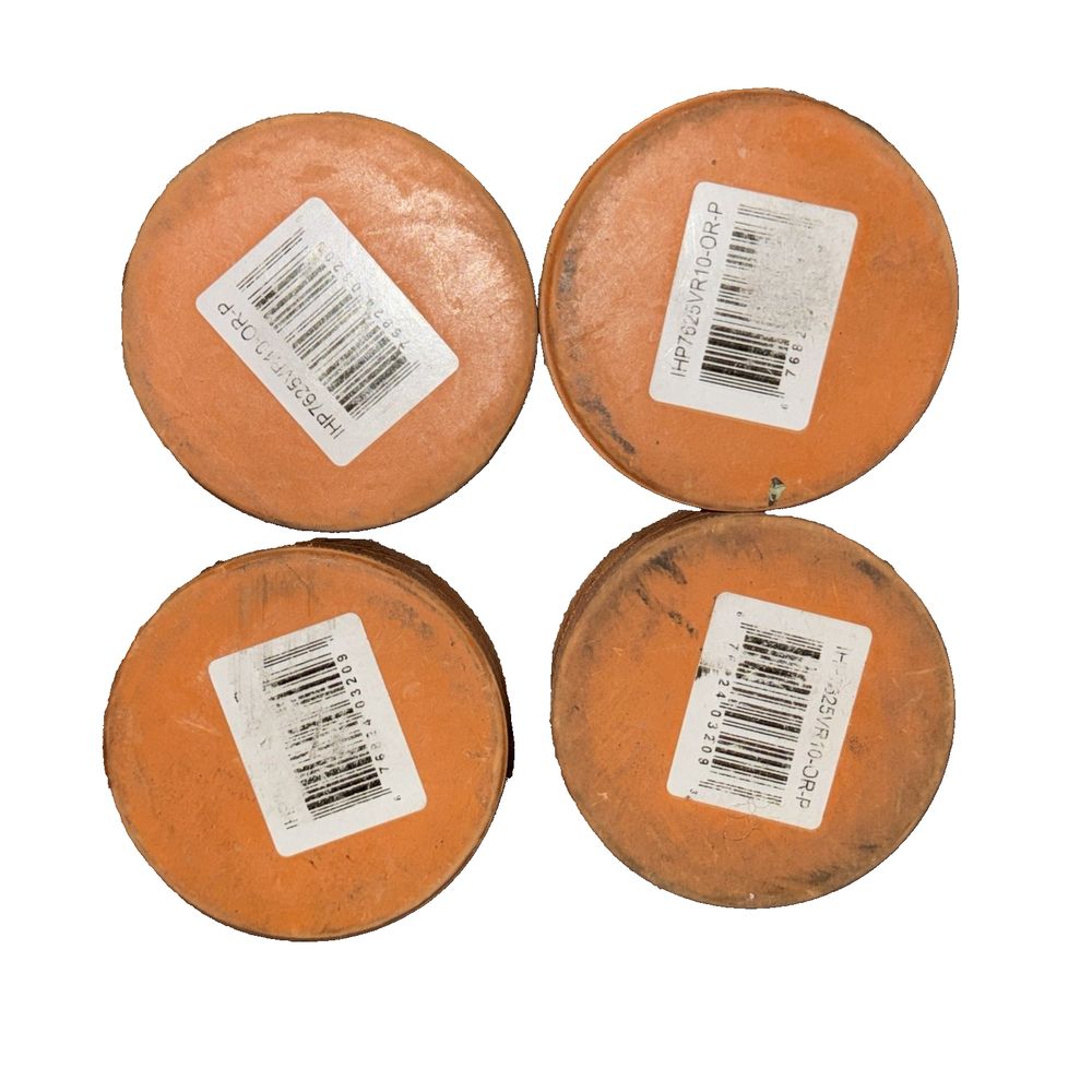 Winnwell Weighted Ice Hocky Pucks Orange 10 oz 4 Pack – four orange round wooden coasters with barcode labels