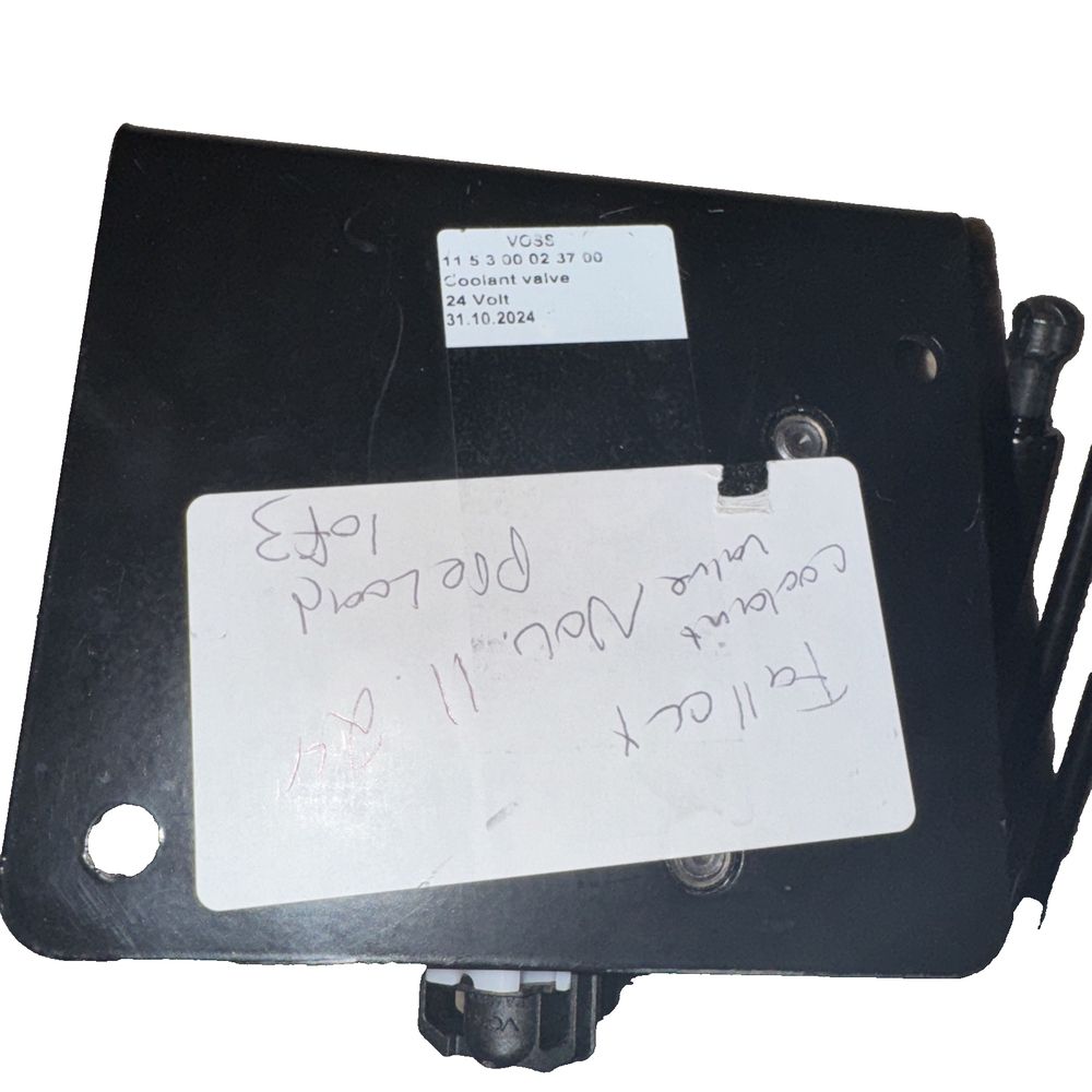 Climate Control - Water Control Valve, WABCO – a white sign with a black and white tag