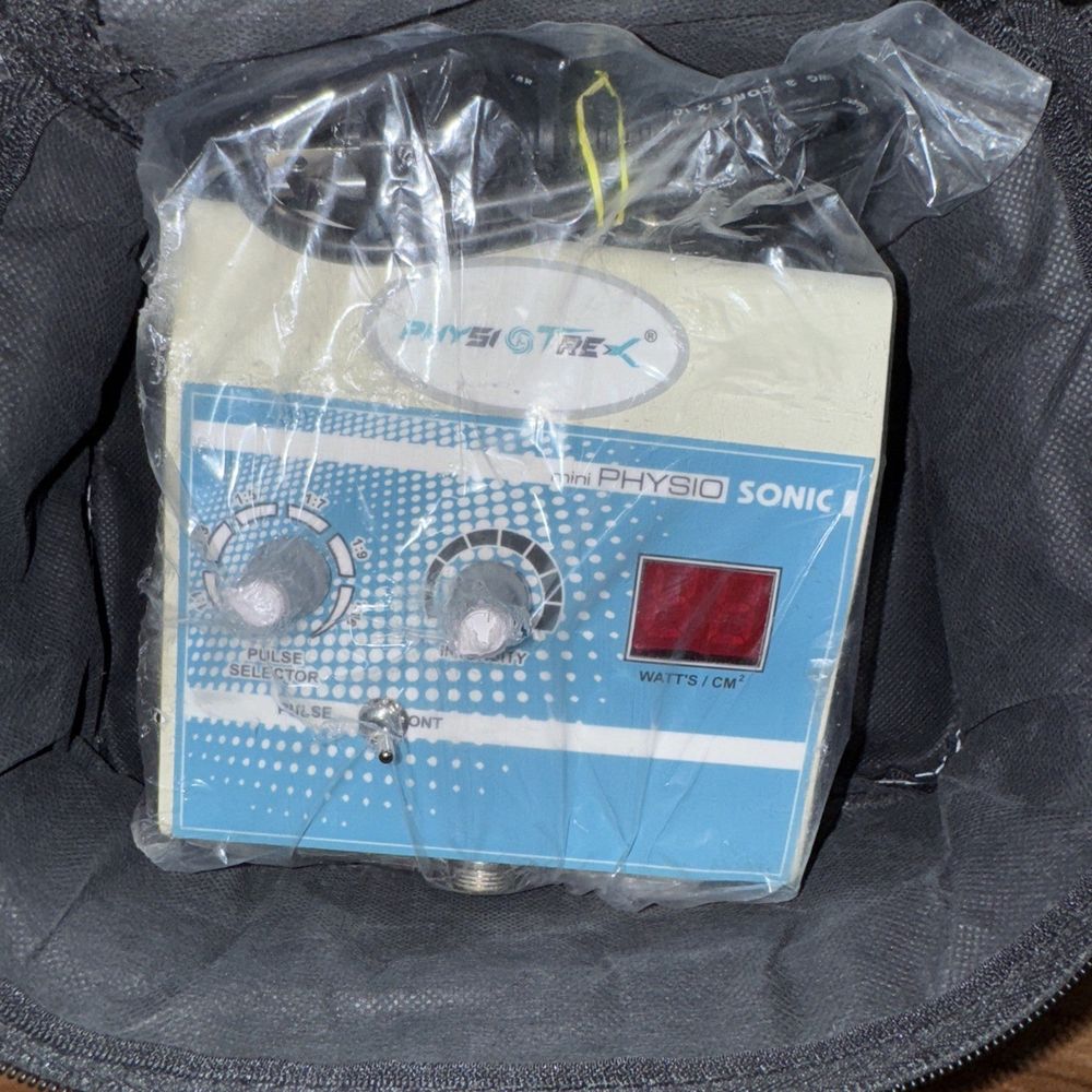PHYSIOTREX Ultrasonic Machine Professional Physiotherapy – a bag with a small device inside of it