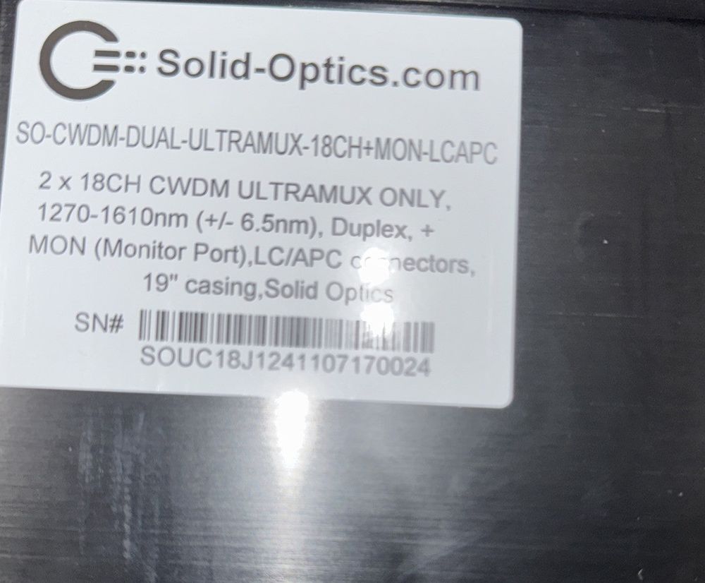 Solid Optics SO-CWDM-DUAL-Ultra Mux-18CH+moon-lc apc (No Cables) – a close up of a metal object with a label