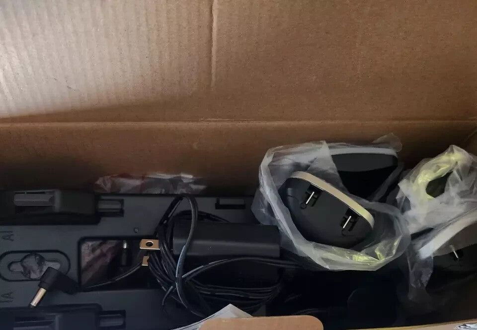 VTech 4-Handset Expandable Cordless Phone with Super Long Range & Bluetooth Conn – a box with a gun and other items