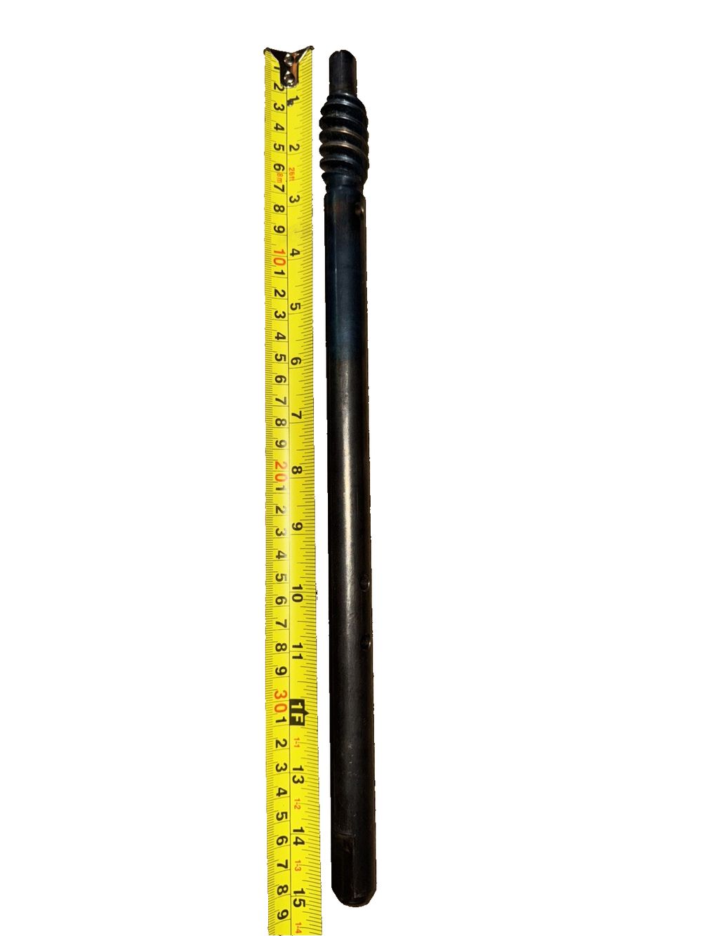 Impeller Shaft Replacement 15" Length 0.75" Width, Unbranded – a black plastic ruler with a yellow tape