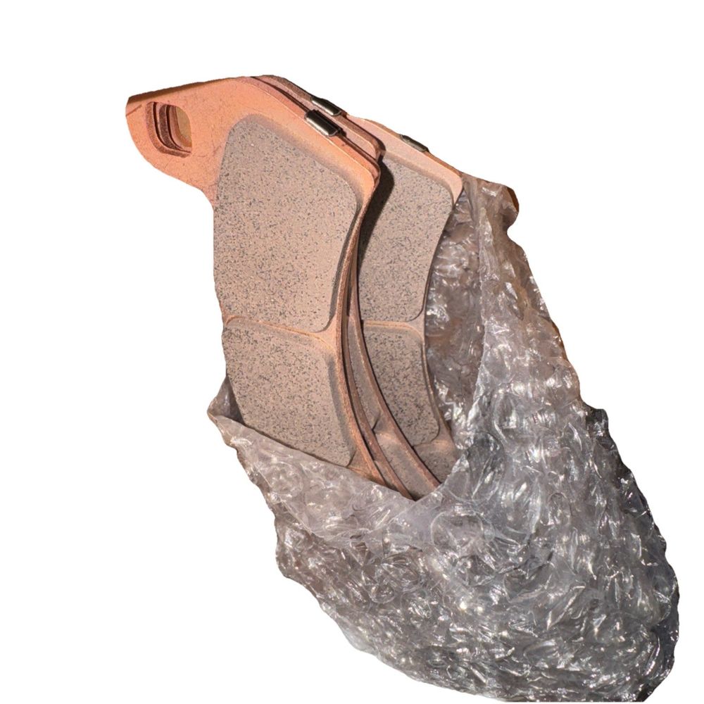 Brake Pads Kit Assembly, Part 2206231, Set of Two Brake Pads, Polaris – a close up of a brake pad on a white background
