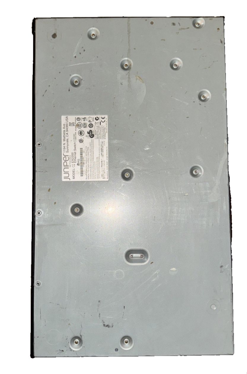 Juniper EX2200-48T-4G Network Switch – a metal plate with screws and screws