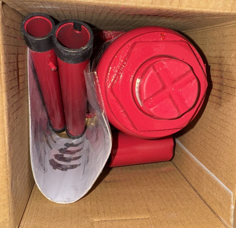 Powerbuilt 6 Ton Bottle Jack, Hydraulic Lift, Heavy Duty Stable Base, 12000 Poun – a red fire hydra in a cardboard box