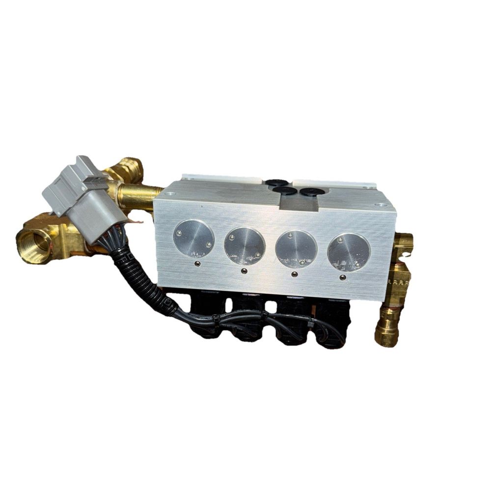 MCE11164 | Genuine Parker Kneeling Module, New Flyer – a white and gold colored valve with two valves