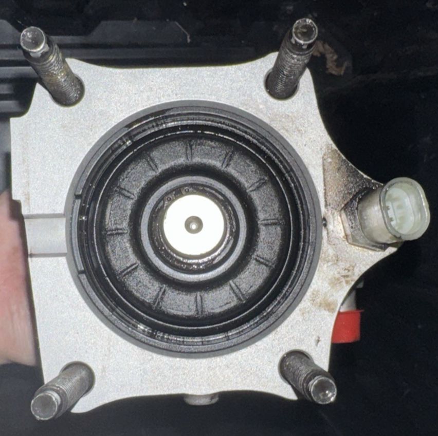 0204745907 | Genuine International® Hydromax Brake Cylinder Pump – a person holding a car wheel with a wren