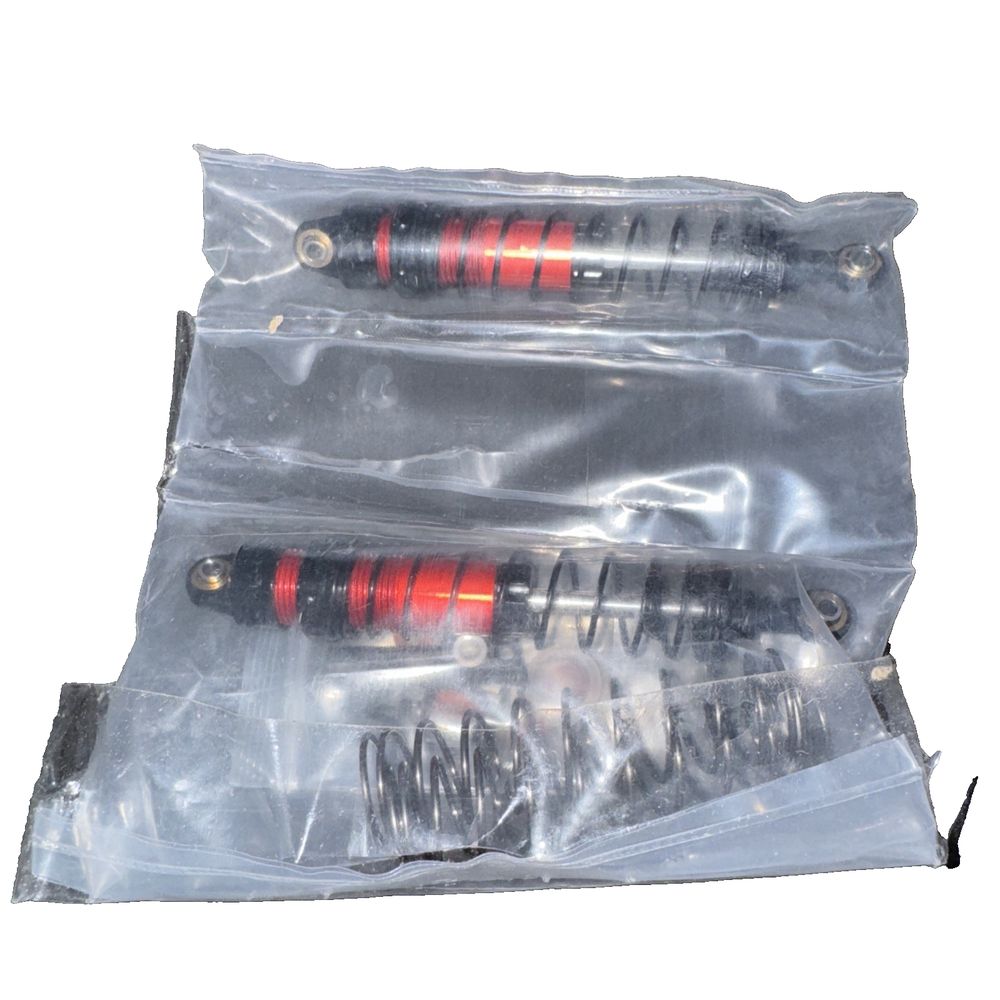 Injora 39mm Shocks- Aluminum threaded Shot Ajustable Absorber Oil Damper 4 PCK – a pair of red and black plastic bags with a white backgrou…