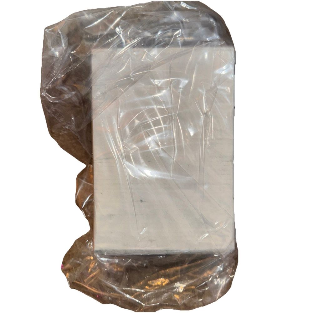 Brass Plated Standard Hanger With Nail 50 PC (5 Packs), Hillman Group – a white rock with plastic wrap around it