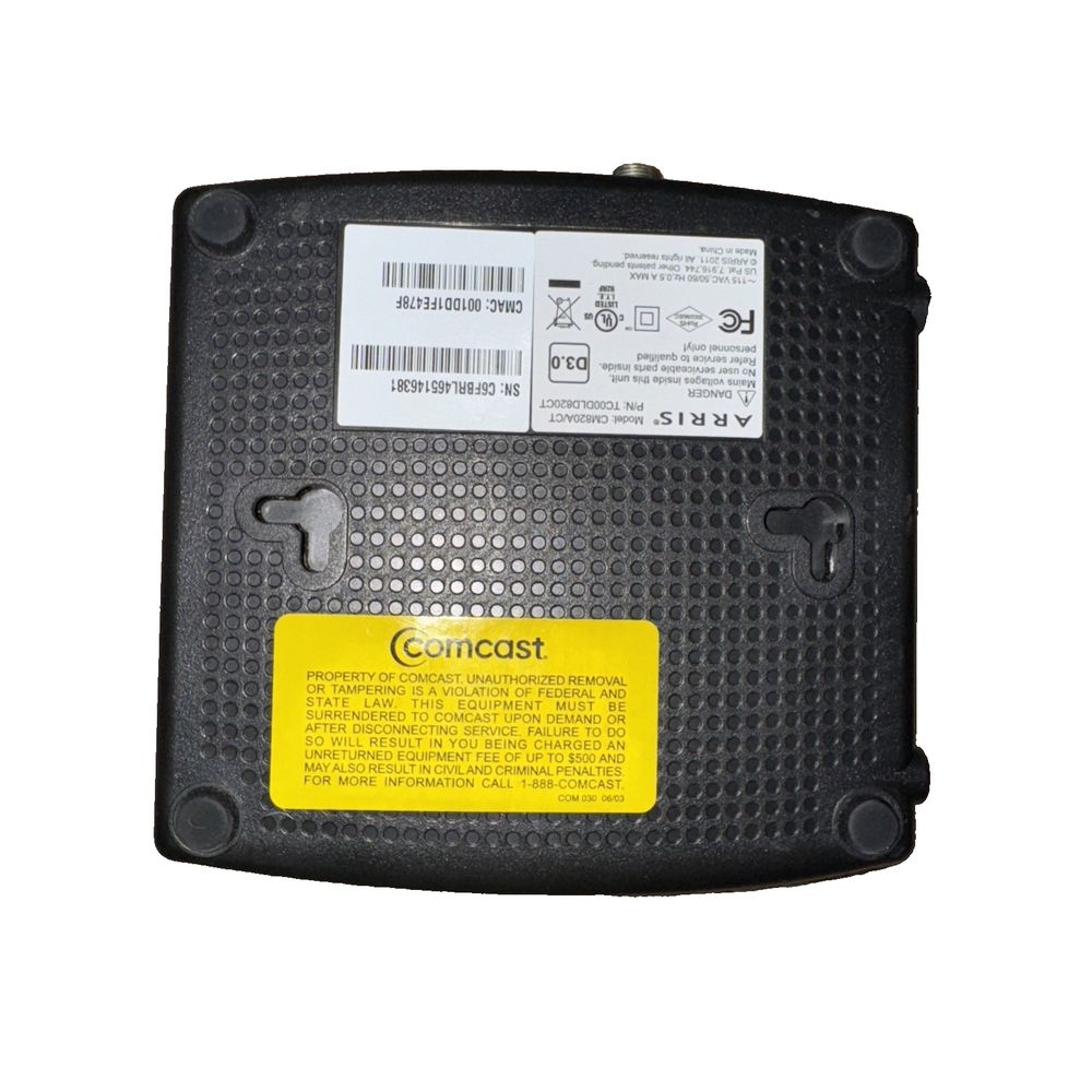 Arris CM820A (Comcast Version) DOCSIS 3.0 Cable Modem + Power Cord – a black and yellow label on a white background