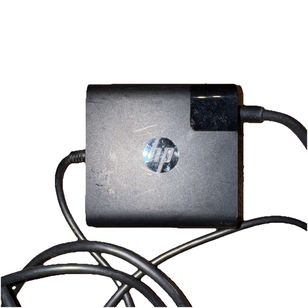 Genuine HP 65W USB C Power Adapter for X360 TPN-AA03 – a small black power cord with a white background