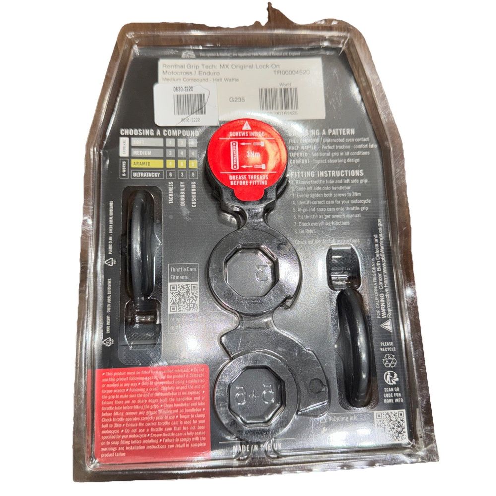 Renthal Original Lock-On Half Waffle MX Grips - Medium – a black and red plastic box with a red button