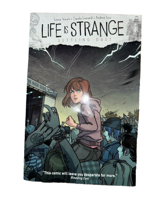 Life is Strange Vol. 6: Settling Dust (Graphic Novel), DaveyDooDeals – the cover of the book, the strange stranger, featuring a girl in a p…