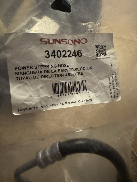 Sunsong 3402246 Power Steering Pressure Hose Assembly (Nissan), Sunsong North America – a label on a metal object that is on a table