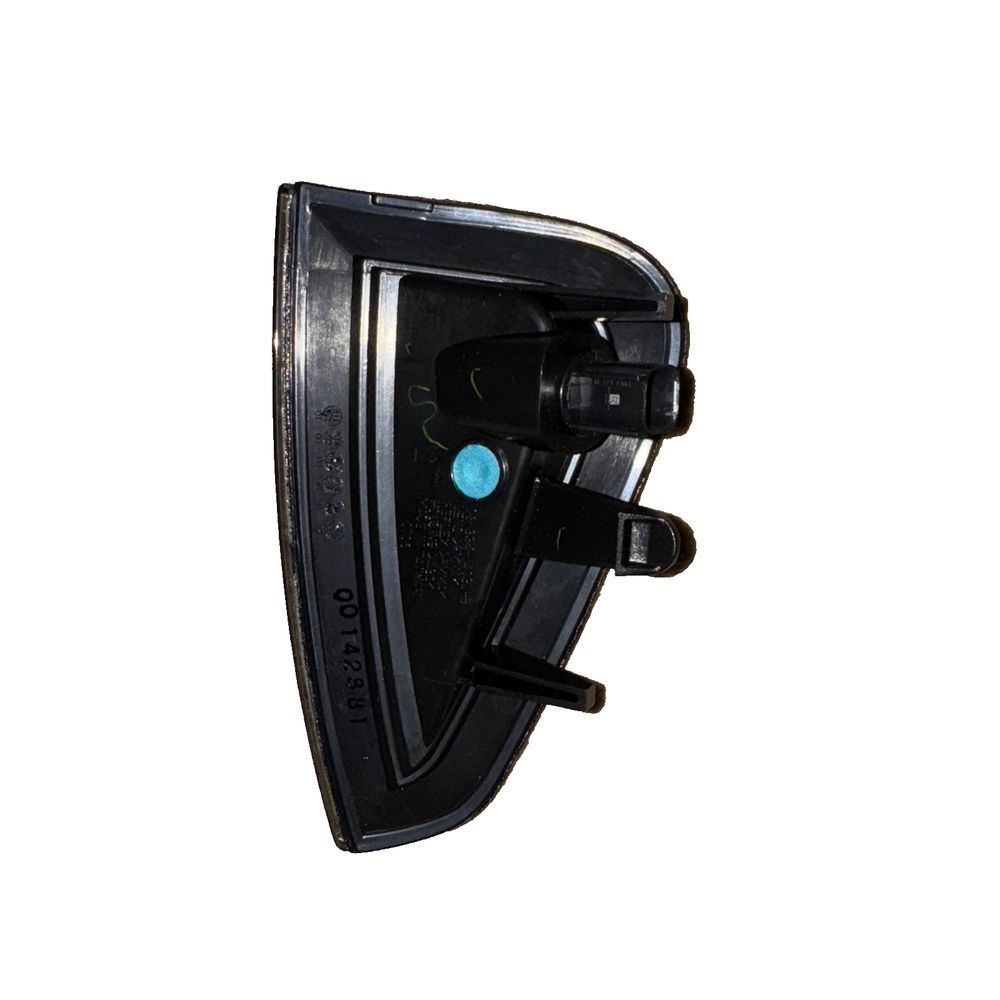 08-334-1403l-B Side Marker Light Assembly Front Left Black Dodge Charger, Unbranded – a black and blue light on a white background