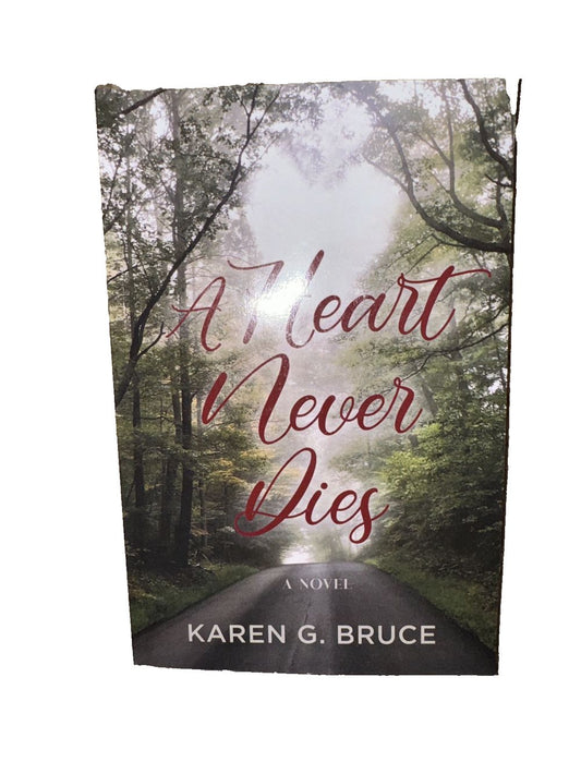 A Heart Never Dies, DaveyDooDeals – a book cover with the title of a road in the woods