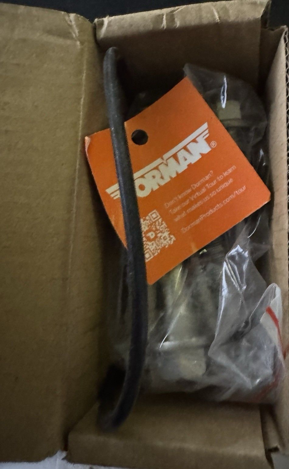 Dorman 926-127 Rear Axle Bolt Compatible with Select Ford Models – a box with a knife inside of it