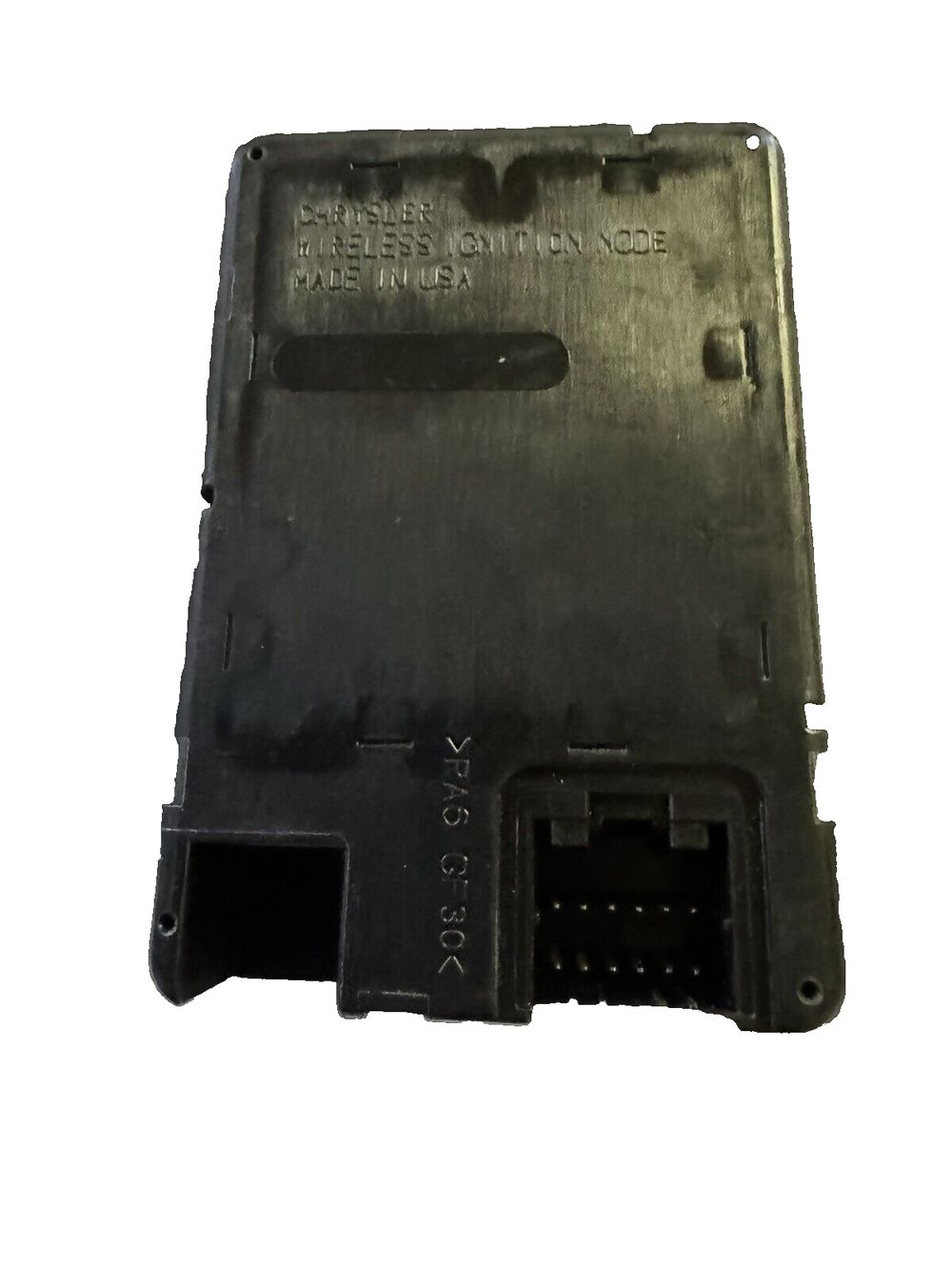 Wireless Chrysler Ignition Module 68105739AC – a black plastic box with a white background