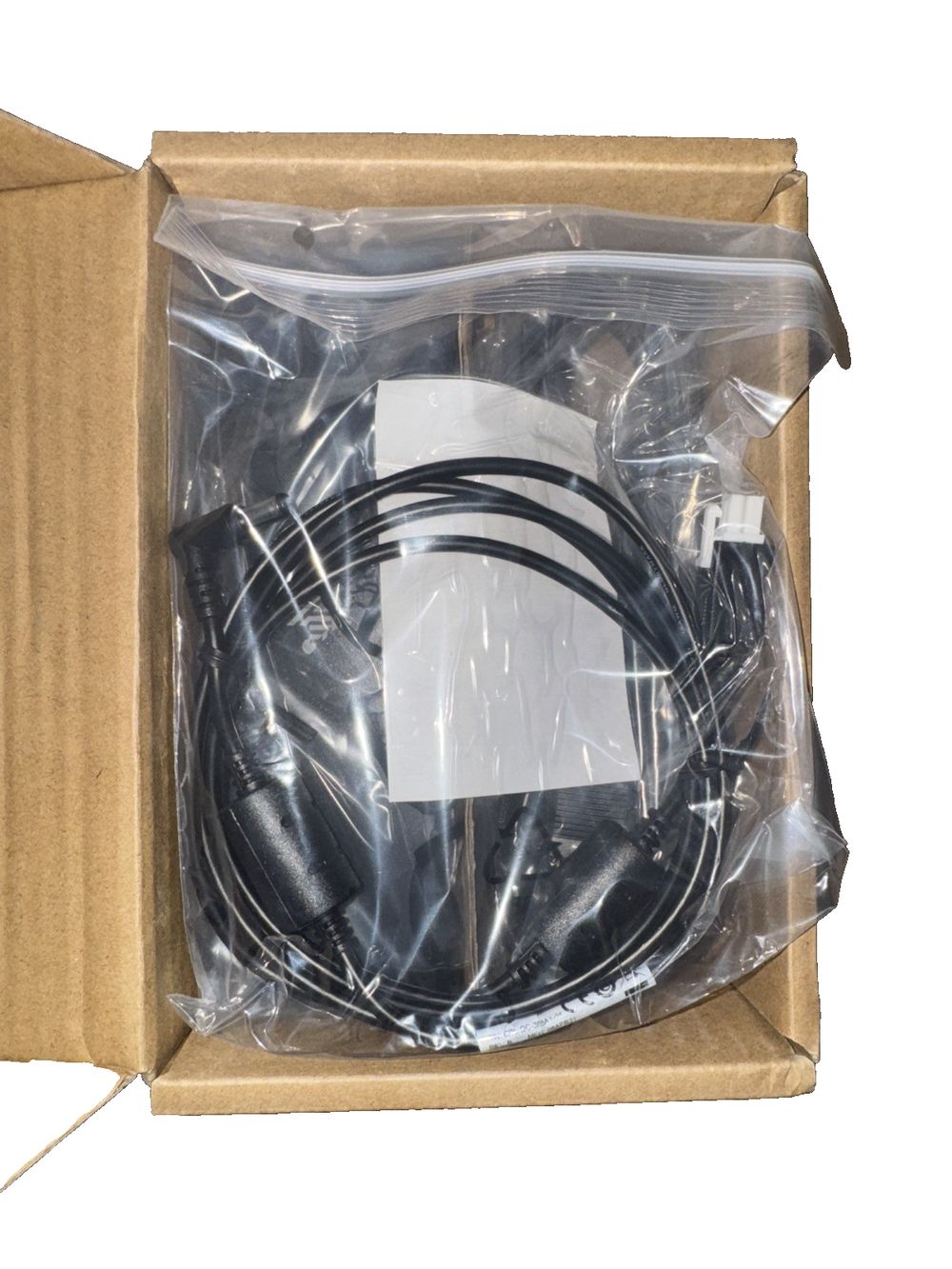 Zebra 3-Slot Battery Charger - battery charger – a box with a black cable inside