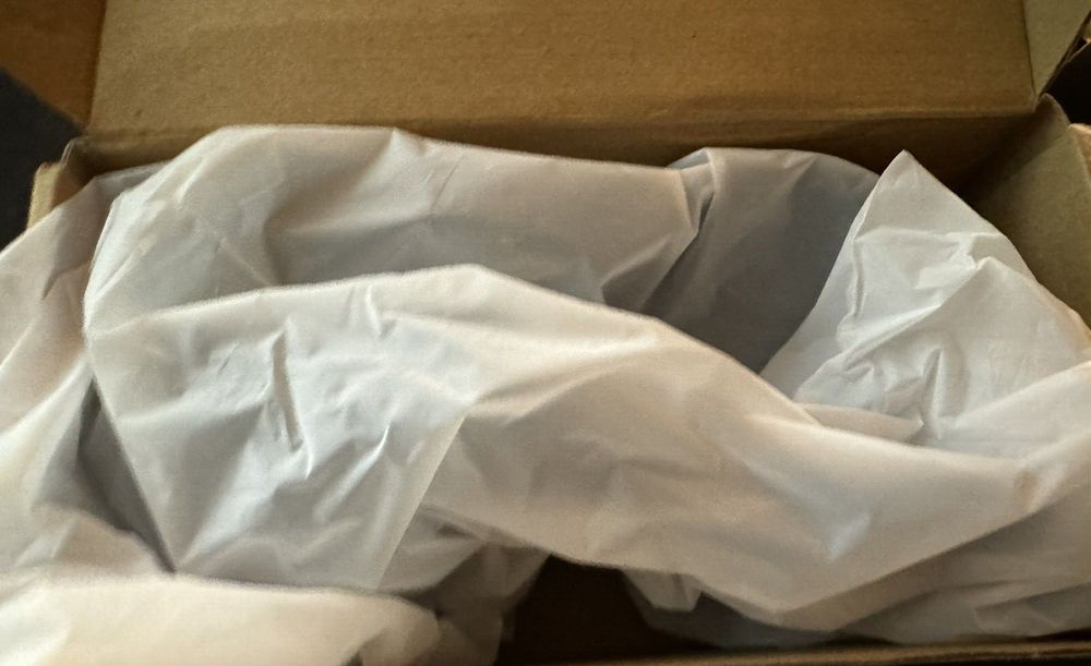 Rislobx Tesla Model 3 Model Y Cup Holder Insert Center Console Water Cup Limit C – a box with a white tissue on it