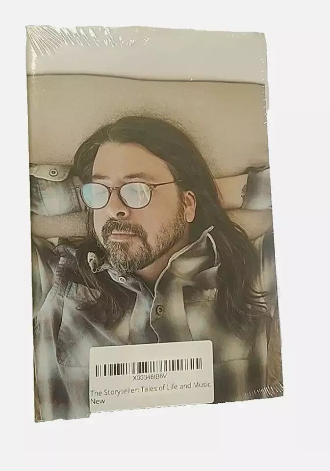 The Storyteller: Tales of Life and Music by Dave Grohl - Inspiring Memoir, DaveyDooDeals – a picture of a man with long hair and glasses