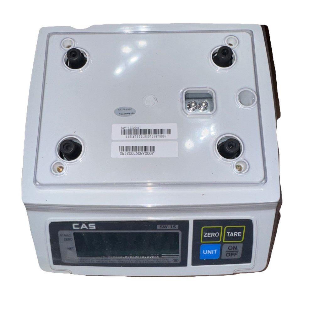 Cas Sw-1-20 Portable Digital Scale 20 lb x 0 01 lb Legal for Trade – a white electronic device with a bar on the back