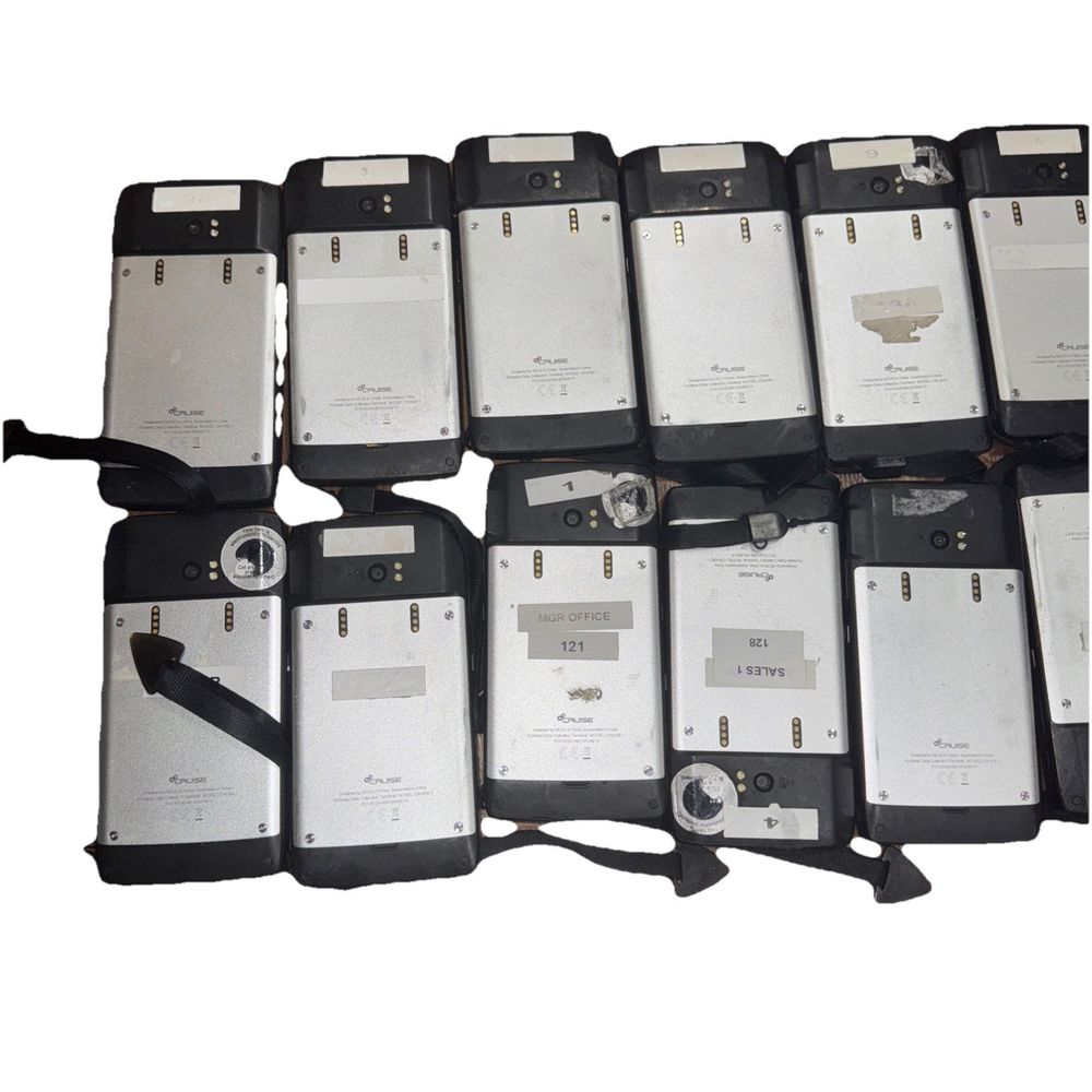 SEUIC CRUISE™1-(P) Handheld Computer Lot of 13 For Parts/Repair – a bunch of cell phones sitting on top of each other cell phones