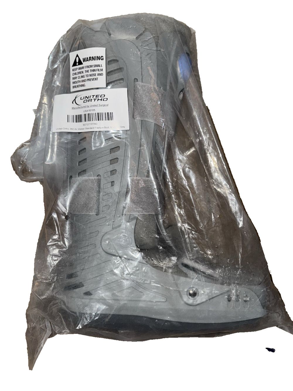 360 Air Walker Standard Fracture Boot Medium Grey, United Surgical – a plastic bag with a label on it