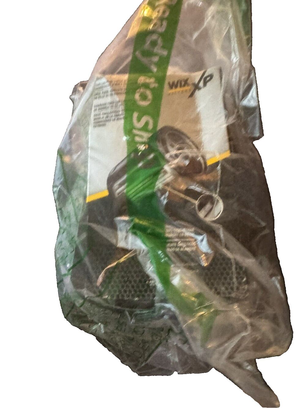 WIX XP 57045XP WIX XP Spin-On Lube Filter WIX XP Filtro Roscado de Aceite WIX X – a bag of food sitting on top of a white surface