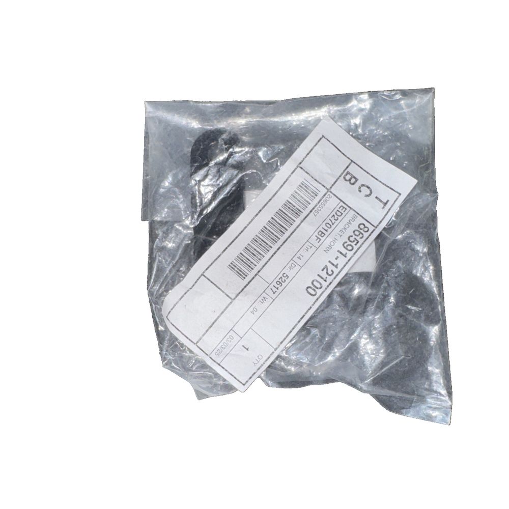 Bracket - Toyota (86591-12100) – a piece of plastic wrap on a white background