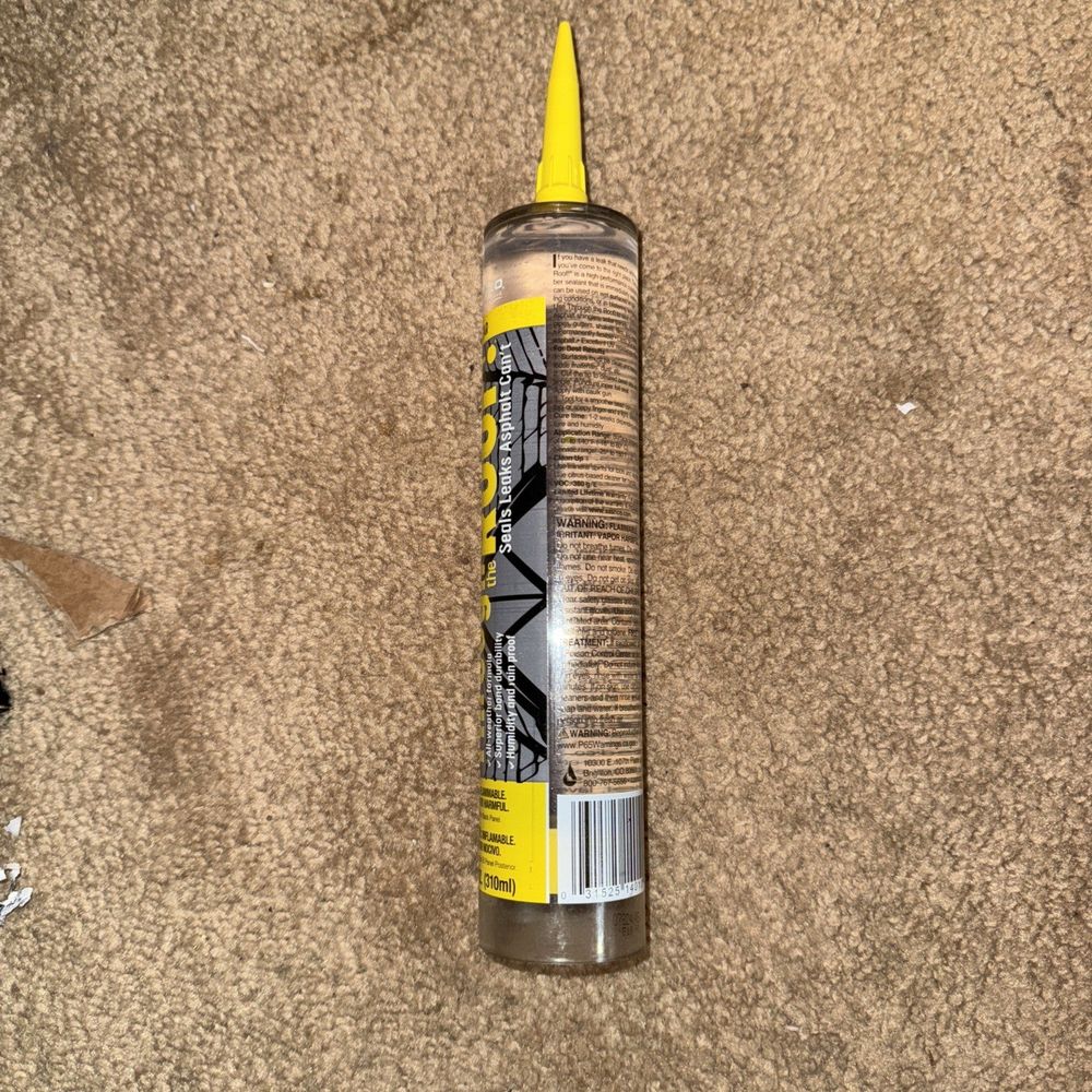 SASHCO Through the ROOF 10.5 oz. Clear High Performance Roof Caulk – a can of spray paint on the floor
