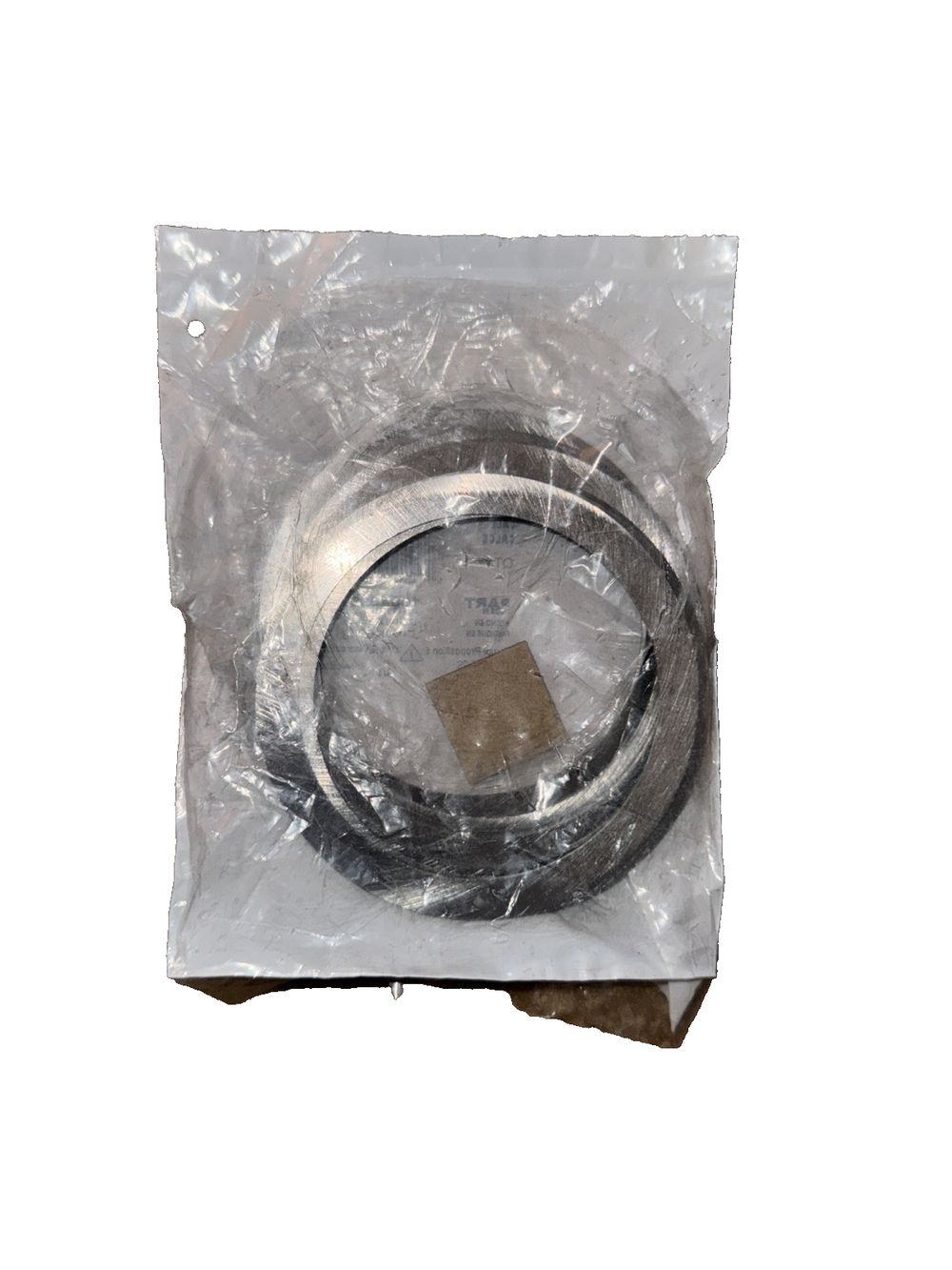 Spicer 10044399 Shim Kit – a piece of plastic wrap with a white background