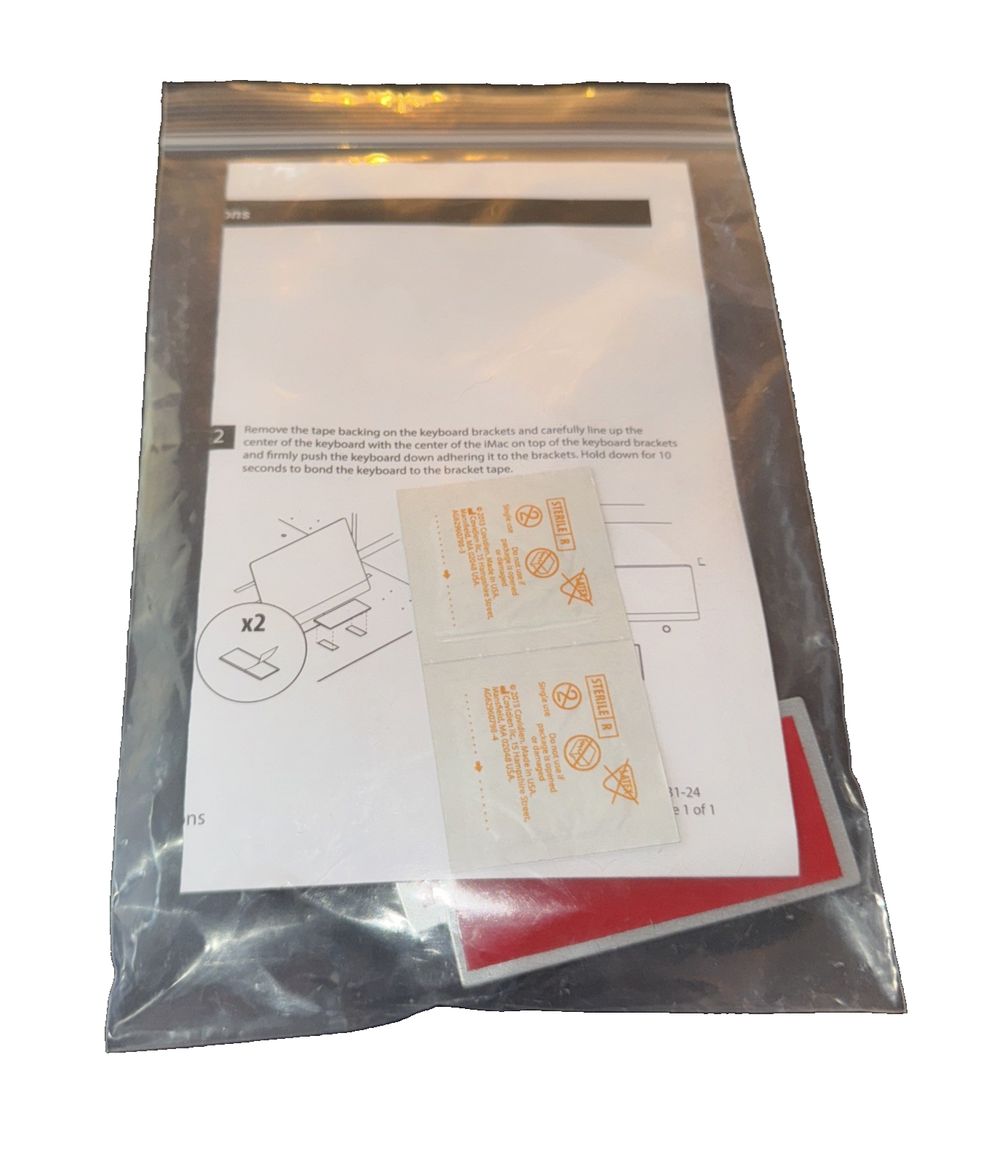 17915-Kit-002-Ca Imac Keyboard KIt, Integrated Marketing Technologies – a package of envelopes with a white envelope and a red envelope