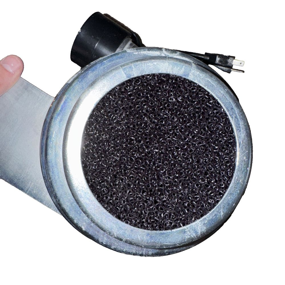 Furnace Draft Inducer/Wood Stove Fan, DaveyDooDeals – a hand holding a metal container filled with black seed
