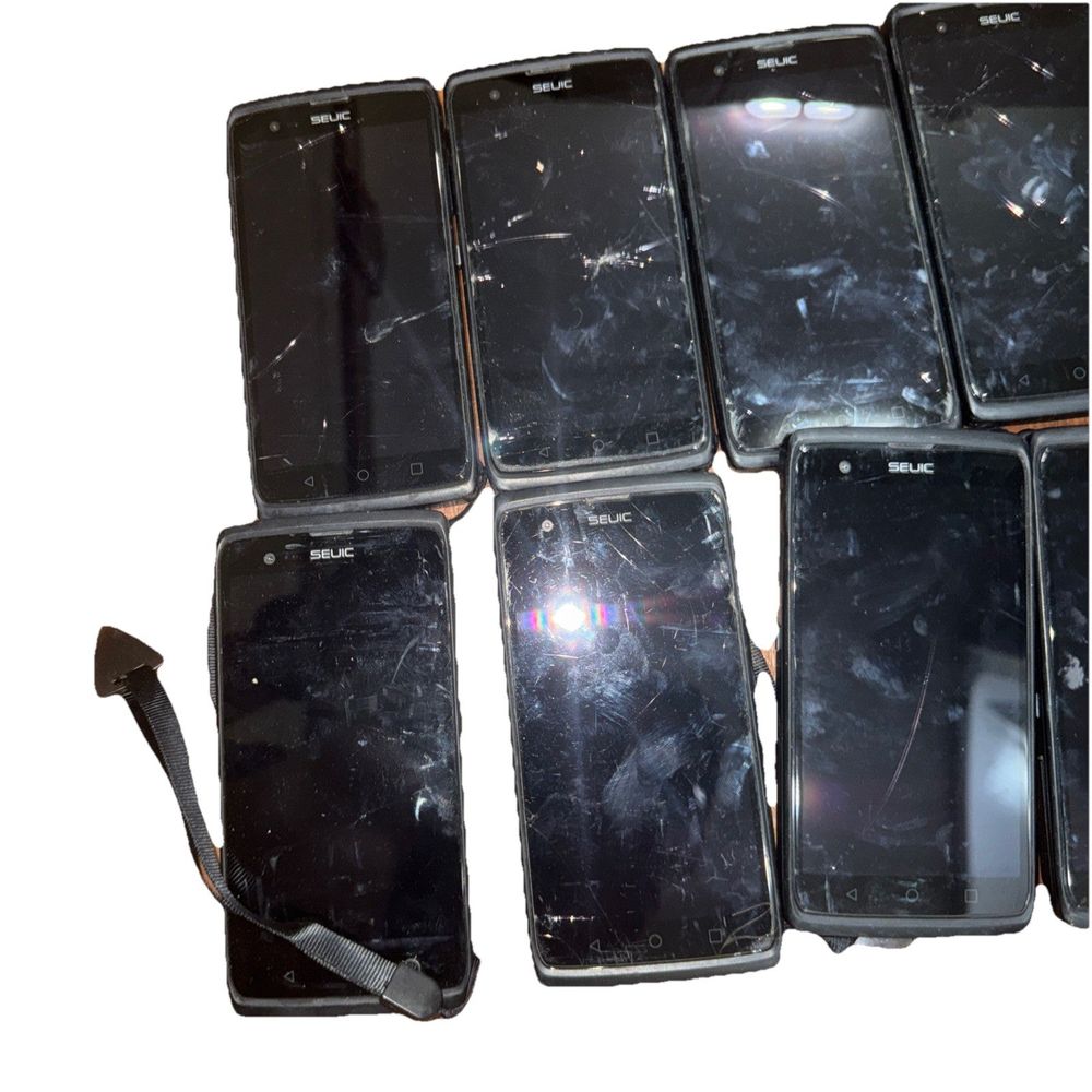 SEUIC CRUISE™1-(P) Handheld Computer Lot of 13 For Parts/Repair – a bunch of cell phones with broken screen