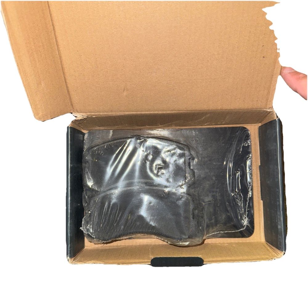 Front Ceramic Disc Brake Pads CMX-D904 For Mitsubishi Lancer, DaveyDooDeals – a box with a black plastic head inside