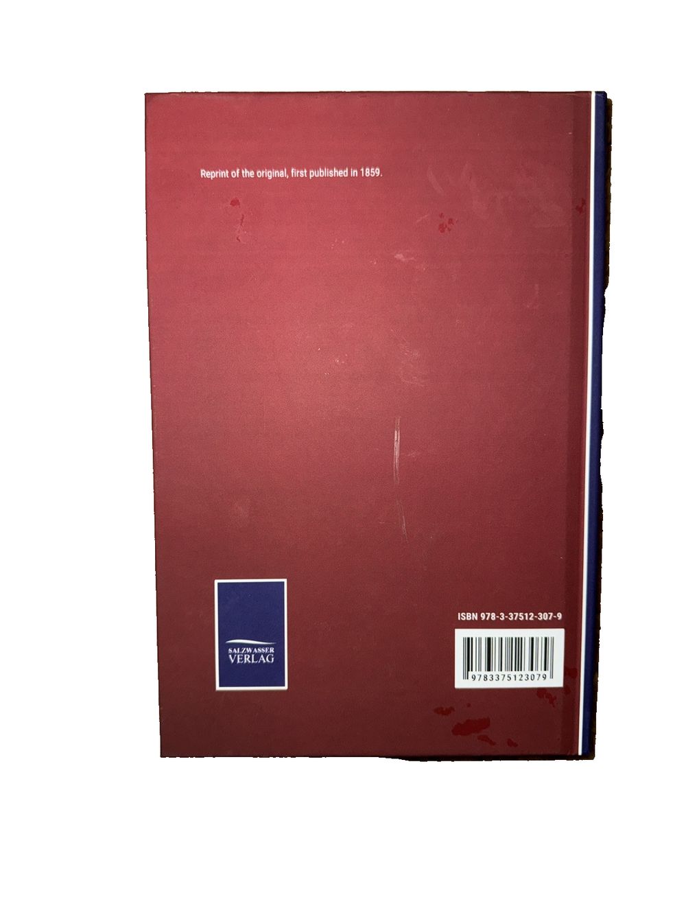 A Manual of Latin Prosody, DaveyDooDeals – the book is red and has a white cover
