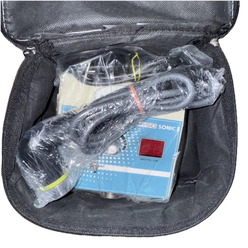 PHYSIOTREX Ultrasonic Machine Professional Physiotherapy – a bag with a device inside of it