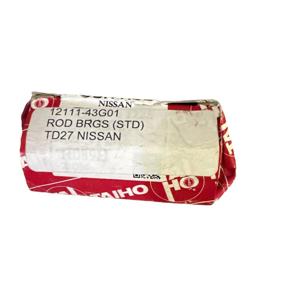 BEARING-CONNECTING ROD 1211143G01 | Nissan Parts, Taiho – a red and white bag with a white label