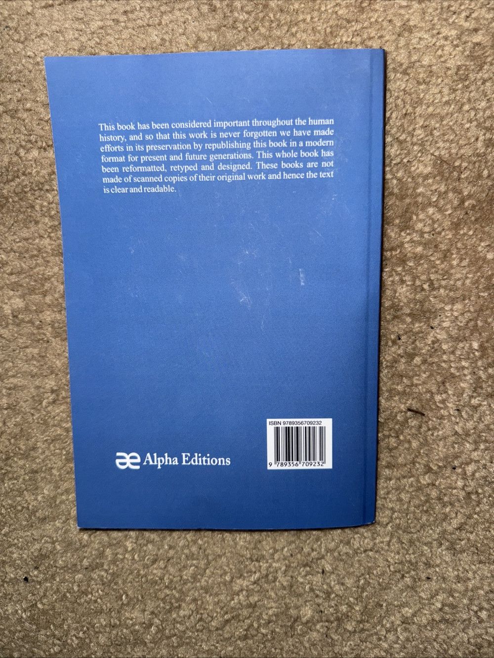 Novellen, DaveyDooDeals – the book has a blue cover with a white logo