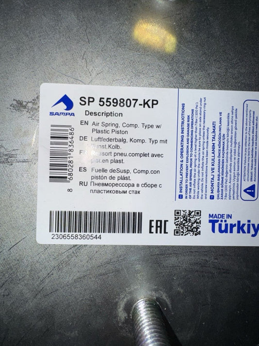 Sampa SP559807 Air Spring – a label on a metal plate with a bar