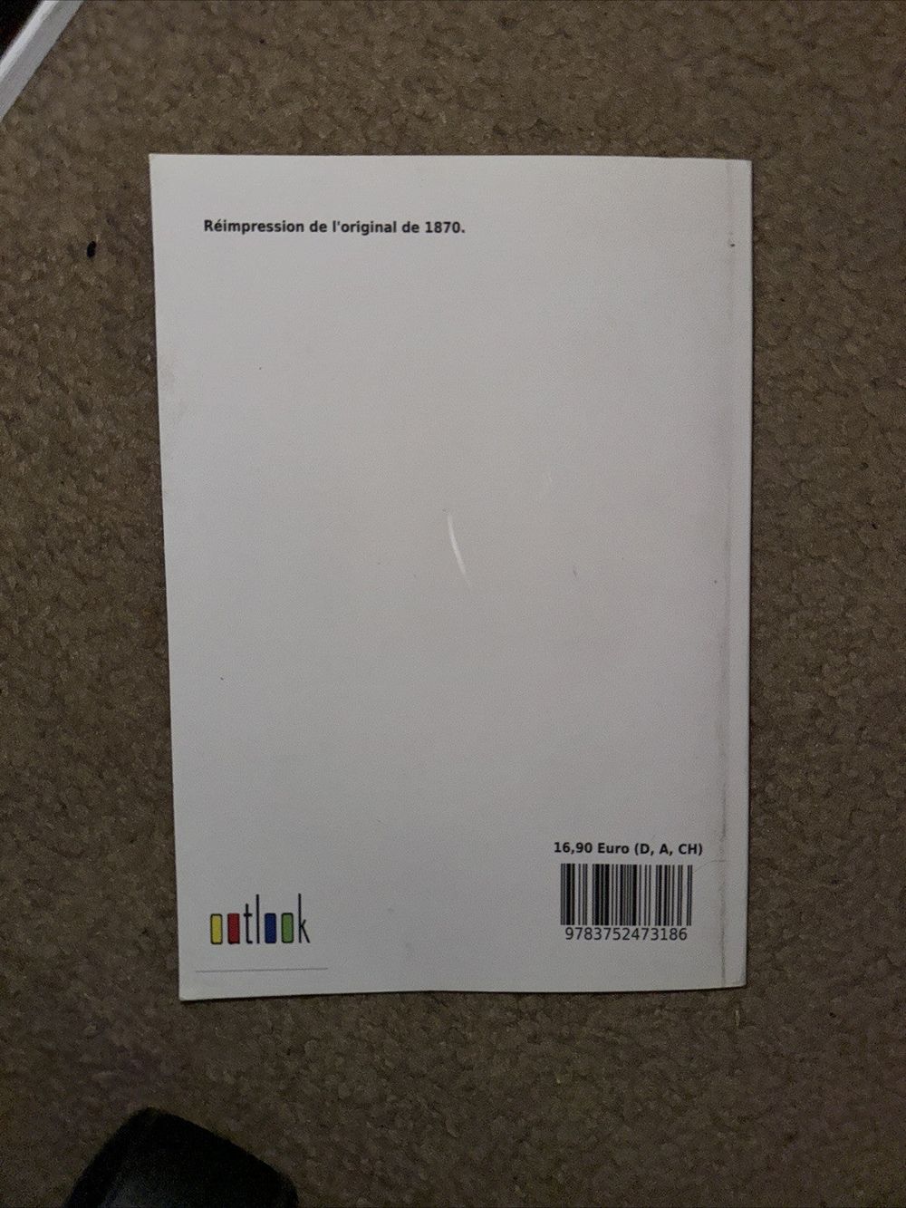 La Pche au Cormoran, DaveyDooDeals – a white book sitting on the floor